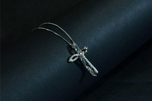 What Does Diamond Pave Cross Pendant Symbolize?