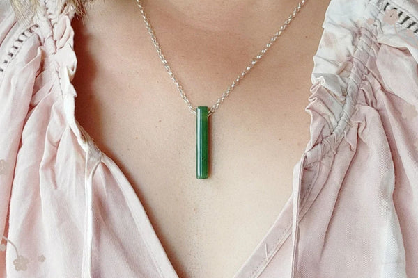 What Is the Significance of a Jade Bar Pendant?